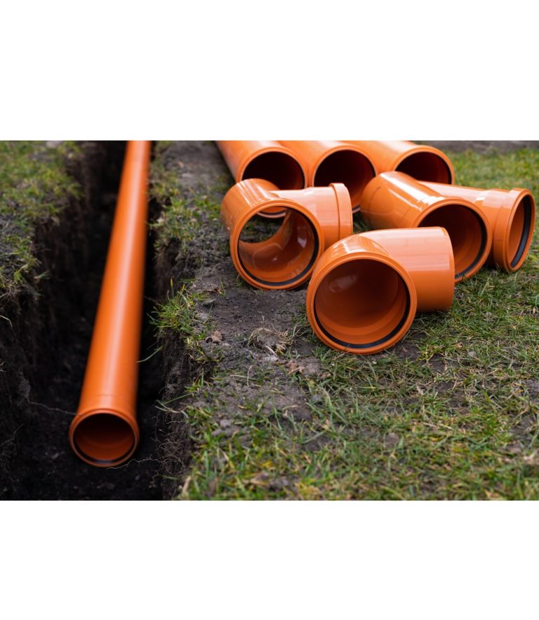 Laying,Down,Orange,Pvc,Drainage,Pipes,Into,The,Ground